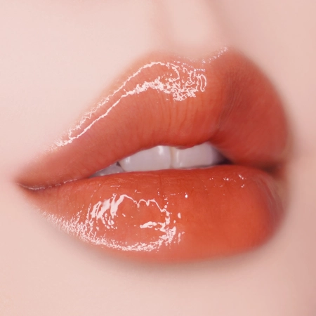 Unleashia - Sisua Popcorn Syrup Lip Plumper - No.4 Honey Grapefruit - Hydratačný lesk na pery - 3,8 g